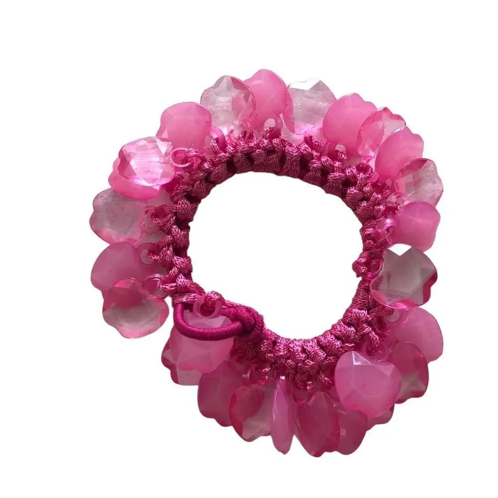 2 Scrunchies: Pink Apples and Yellow Balls that click against each other when in